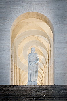 Statue in front of the Palazzo della Civilta in Rome, Italy photo