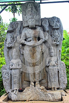 a statue in the front yard of Singosari temple