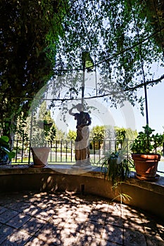 Statue in the garden of Santos at Penaguila photo