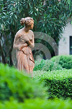 Statue in the garden. Upper town of Bergamo, Italy