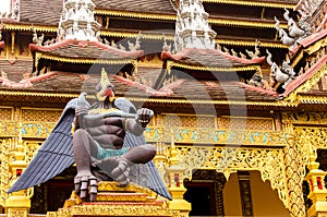 Statue of garuda in the temple photo