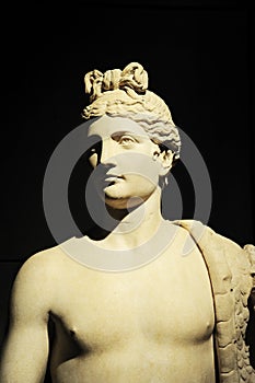 Statue of a Genius with cornucopia. Genius of the emperor Domitian. Rome, Italy