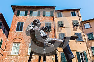 Statue of Giacomo Puccini in front of his birthplace in Lucca, Italy