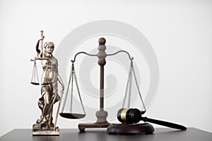 statue of god Themis Lady Justice is used as symbol of justice within law firm to demonstrate truthfulness of facts and power to