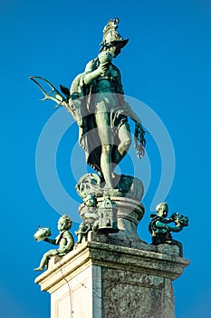 Statue of Goddess Diana on pedestal in Munich