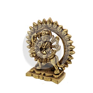 statue of goddess durga devi of hindu religion holding multiple weapons in her many arms, sitting on her lion