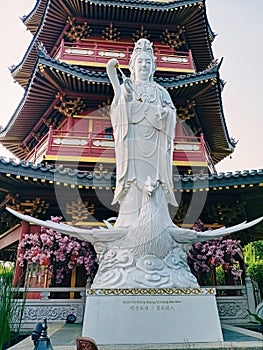 The statue of Goddess Kwan Im is revered by some Chinese people as a loving goddess who always saves people from suffering.