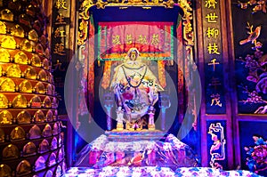 Statue of the Goddess of Mercy Guanyin at Lin Fa Temple, Hong Kong photo