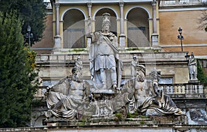 The statue of Godess Roma in Piazza del Popolo, Rome, Italy photo