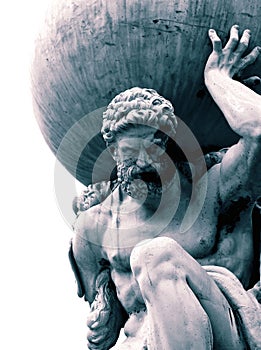 Statue of the Greek God Atlas holding the globe on his shoulders. photo