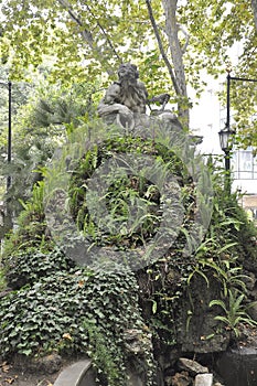 Statue from the Green Garden of Historic Avenue Liberdade in Downtown of Lisbon
