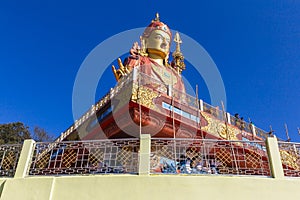 Statue of Guru Rinpoche, the patron saint of Sikkim that view from below in Guru Rinpoche Temple at Namchi. Sikkim, India