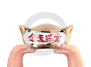 statue hands raised antique chinese gold ingot money isolated on white background