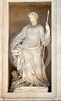 Statue of Health. Detail of the Trevi fountain in Rome, Italy