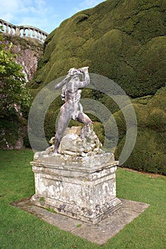 Statue of Hercules killing the hydra, Powis castle garden, UK