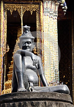 Statue of hermit located in front of temple, wat phra keaw