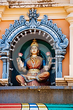 Statue Hindu deities on the roof of temple within Batu Caves. Batu Caves - a complex of limestone caves in Kuala Lumpur, Malesia