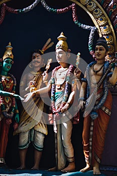 Statue Hindu deities on the roof of temple within Batu Caves. Batu Caves - a complex of limestone caves in Kuala Lumpur, Malesia