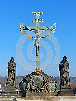 Statue of the Holy Crucifix and Calvary on Charles Bridge in Prague