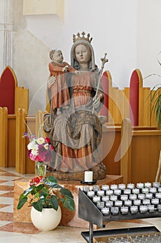 The statue of Holy Maria on the throne in the church of the Monastery of Gaming, Lower Austria