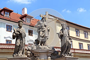 Statue of the Holy Savior with Cosmas and Damian at Charles Bridge, Prague