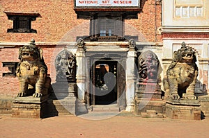 Statue image Lion guarding at Bhaktapur Durbar Square photo