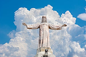 Statue of Jesus Christ above Tibidabo Cathedral in Barcelona, Spain