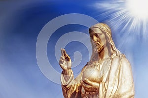 The statue of Jesus Christ. He holds the sphere with a cross as a symbol of the trusteeship of Christianity above the earth