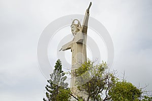 Statue of Jesus Christ in Vung Tau, on the background of cloudy sky