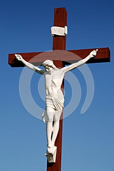 Statue of Jesus Christ on wood cross