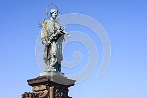 Statue of John of Nepomuk on the Charles bridge in Prague.