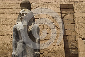 Statue in The Karnak Temple in Luxor with hieroglyphics