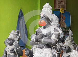 Statue of Kesari Hanuman Lord made of rock stone photo