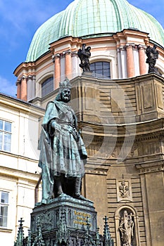 Statue of King Charles IV Karolo Quarto near Charles Bridge in Prague