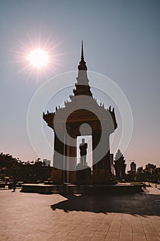 Statue of King Father Norodom Sihanouk on the Streets of Phnom Penh Cambodia photo