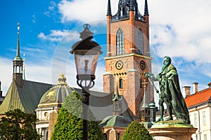 Statue of King Gustav Vasa in front of Riddarholmen Church in Stockholm, Sweden. Summer sunny day