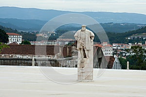 Statue of King Joao III in the yard of University of Coimbra photo