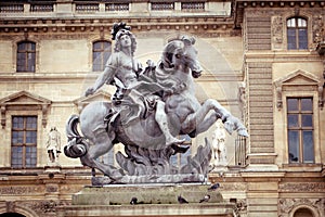 Statue of king Louis at Louvre Museum, Paris