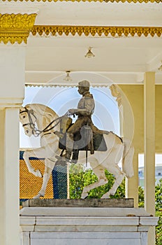 Statue of King Norodom sits on a white horse inside the Royal P
