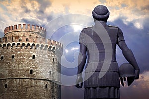 Statue of the King Phillip II next to the White Tower in Thessaloniki, Greece photo