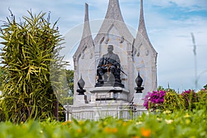 Statue of King Rama III in front of Wat Ratchanatdaram of Bangkok, Thailand.