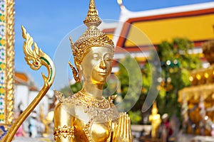 Statue of a kinnara in the temple of the Emerald Buddha, Wat Phra Kaew in Bangkok Thailand