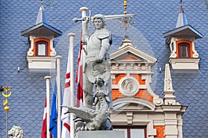 Statue of the knight defeating a dragon in front of the House of Blackheads in Riga, Latvia