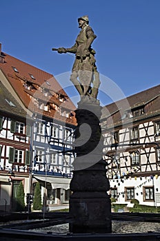 Statue of knight on Rathausplatz, roehr fountain, fachwerk photo