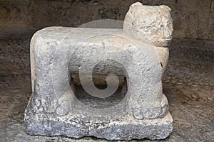 A statue known as a chacmool from the Mayan ruins of Chichen Itza in the Yucatan Peninsula photo