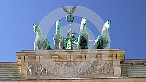 Statue known as the Quadriga, the goddess of victory on top of The Brandenburg Gate, Berlin, Germany