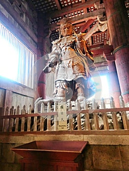Statue of koumokuten, one of the four heavenly kings in Todaiji temple, Nara, Japan