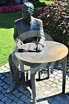 Poland, Baltic Sea, Miedzyzdroje, West Pomerania - a statue pf Krzysztof Kolberger, Polis actor and director in the local parc photo
