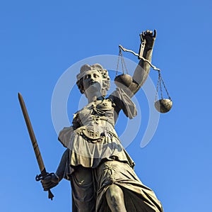 Statue of Lady Justice in front of the Romer in Frankfurt