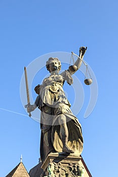 Statue of Lady Justice in front of the Romer in Frankfurt